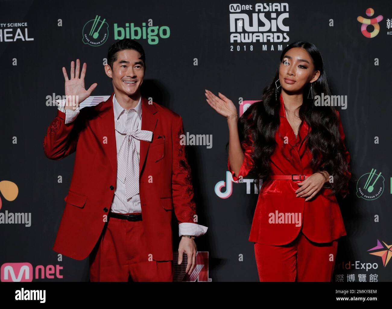South Korean model-actor Bae Jung-nam, left, and model Moon Gabi pose