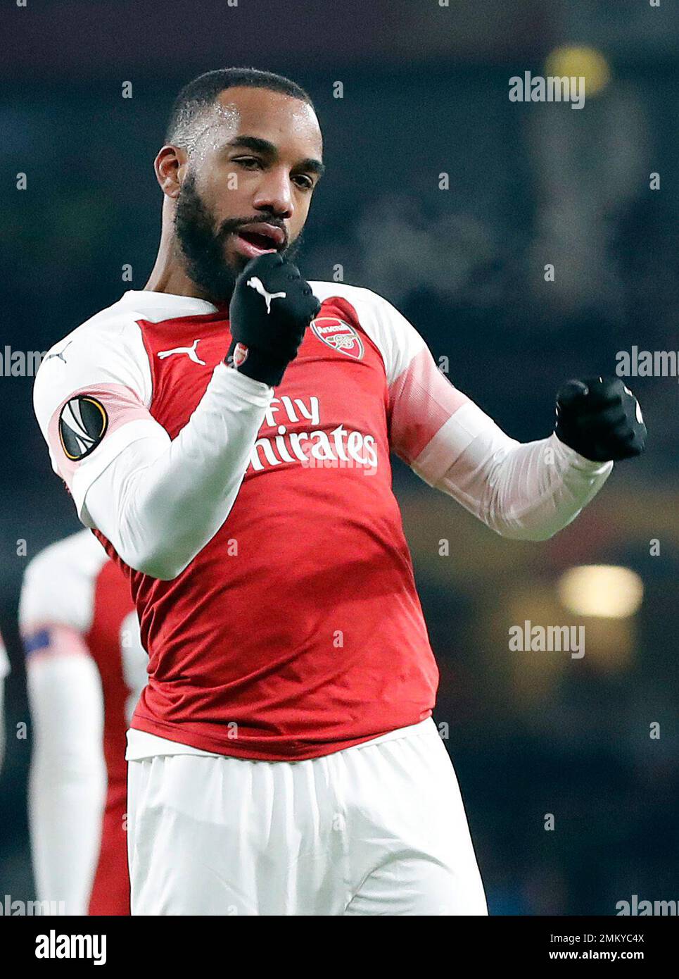 Arsenal s Alexandre Lacazette celebrates after scoring his side s first goal during the Europa League group E soccer match between Arsenal and Qarabag at Emirates stadium in London England Thursday De...