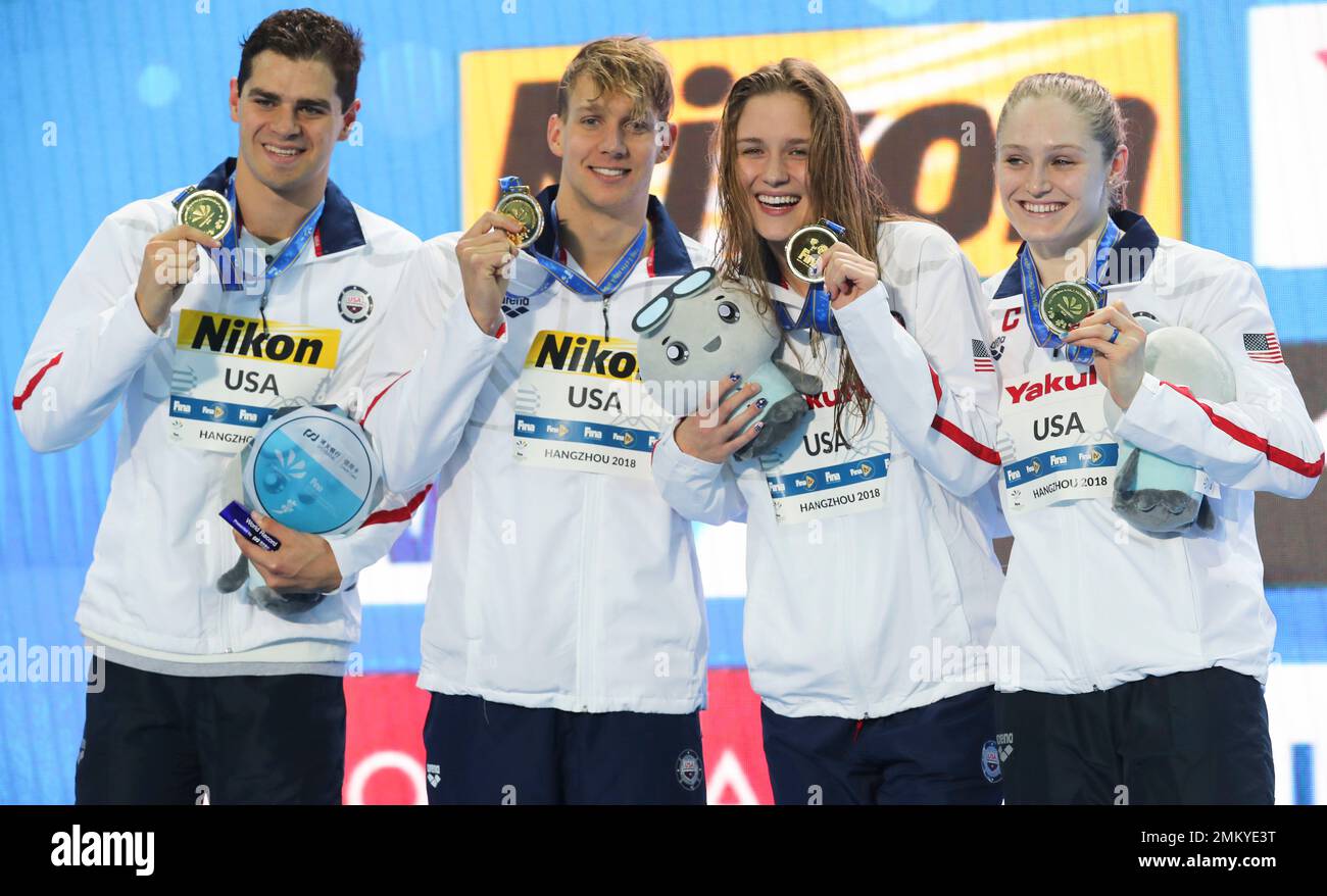 Gold medalist and new world record holders USA team, from left, Michael