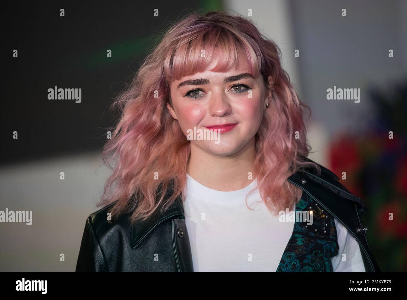 Actress Maisie Williams poses for photographers upon arrival at the