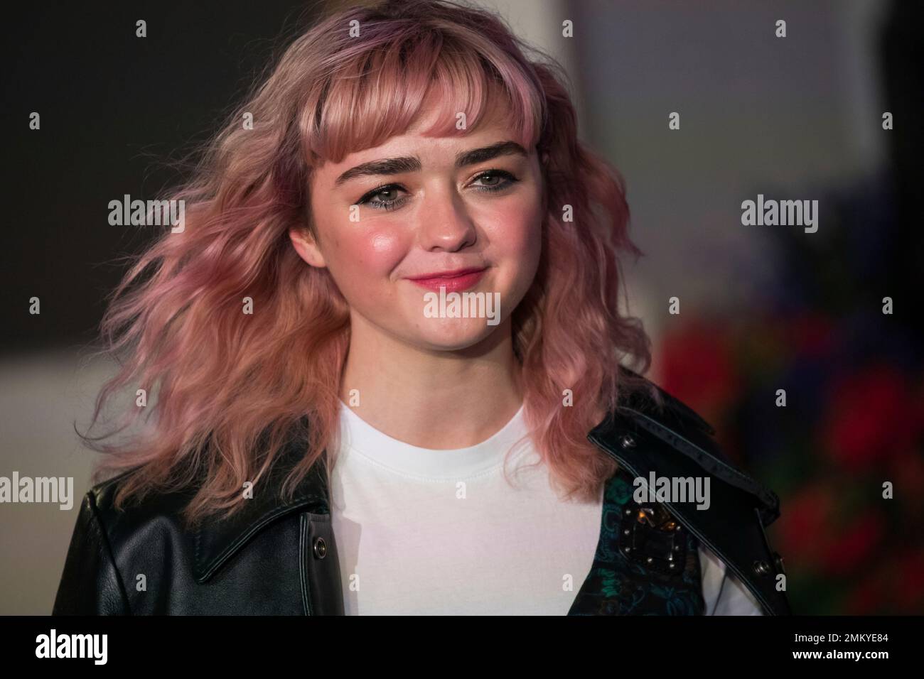 Actress Maisie Williams poses for photographers upon arrival at the