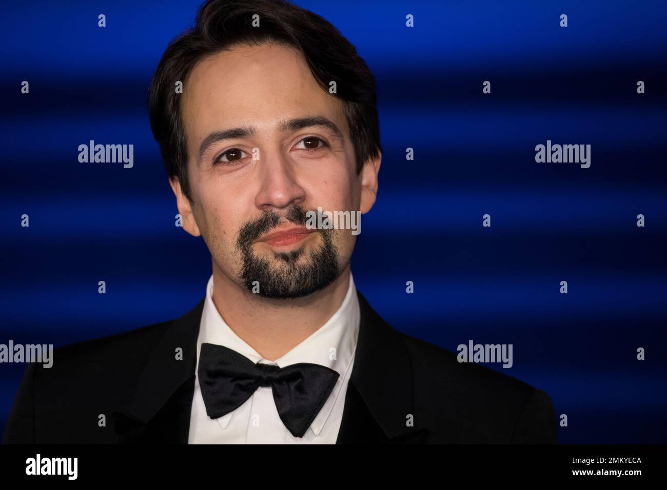Actor Lin-Manuel Miranda poses for photographers upon arrival at the