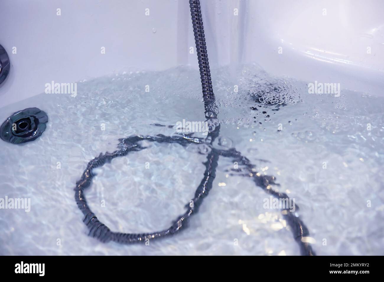 Soap bubbles background. Shampoo foam in the water in bathroom. Jacuzzi