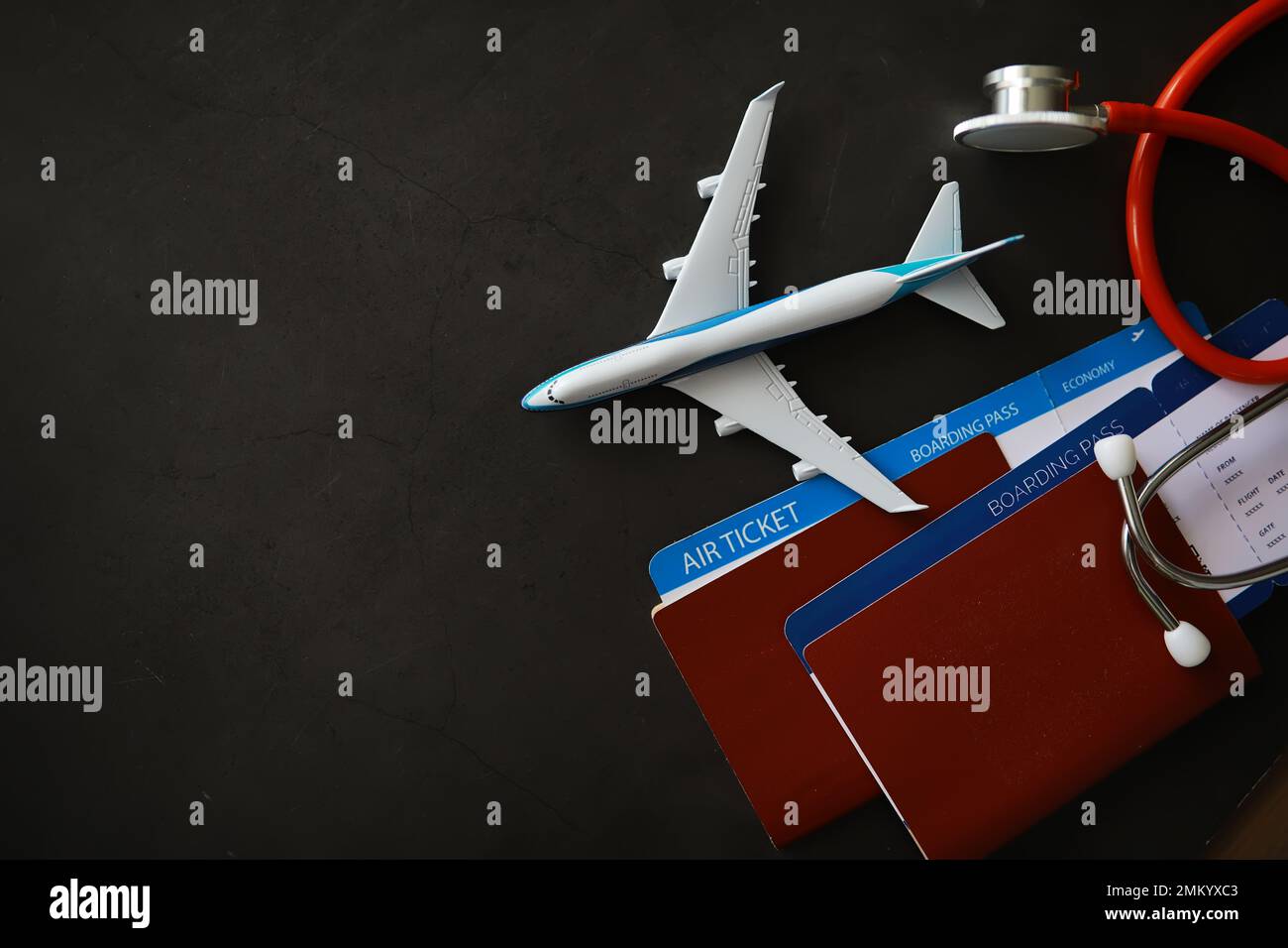 Passenger air insurance concept. Airplane, passport, boarding pass
