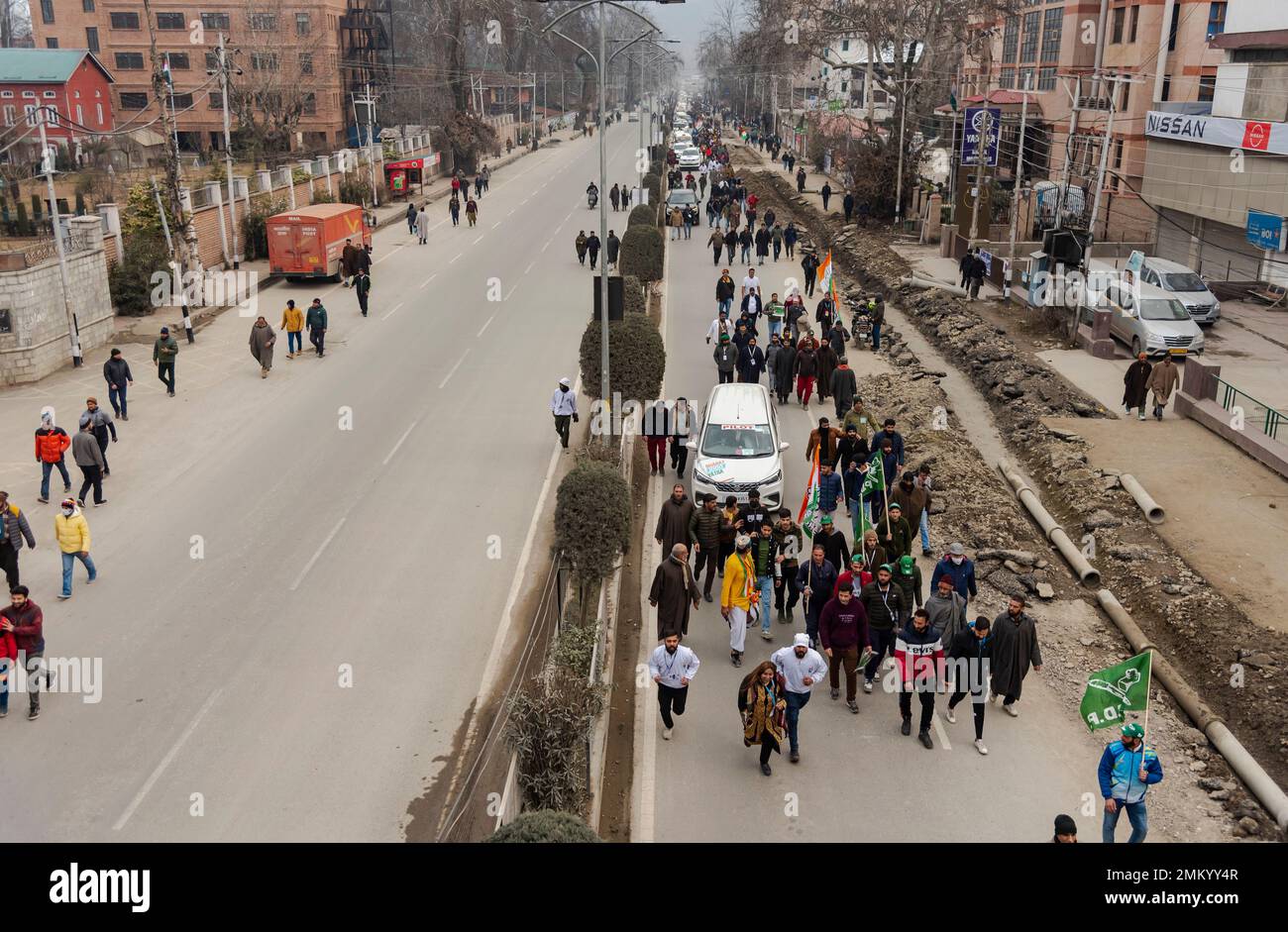 Srinagar, India. 29th Jan, 2023. Supporters of Indian Congress party walk during the Bharat Jodo Yatra in Srinagar. The Congress party is undertaking the 3,570-km ‘Bharat Jodo Yatra' that began at Kanyakumari on September 7, 2022, and will end in Srinagar on January 30, 2022, covering 12 States in 150 days on foot. Credit: SOPA Images Limited/Alamy Live News Stock Photo