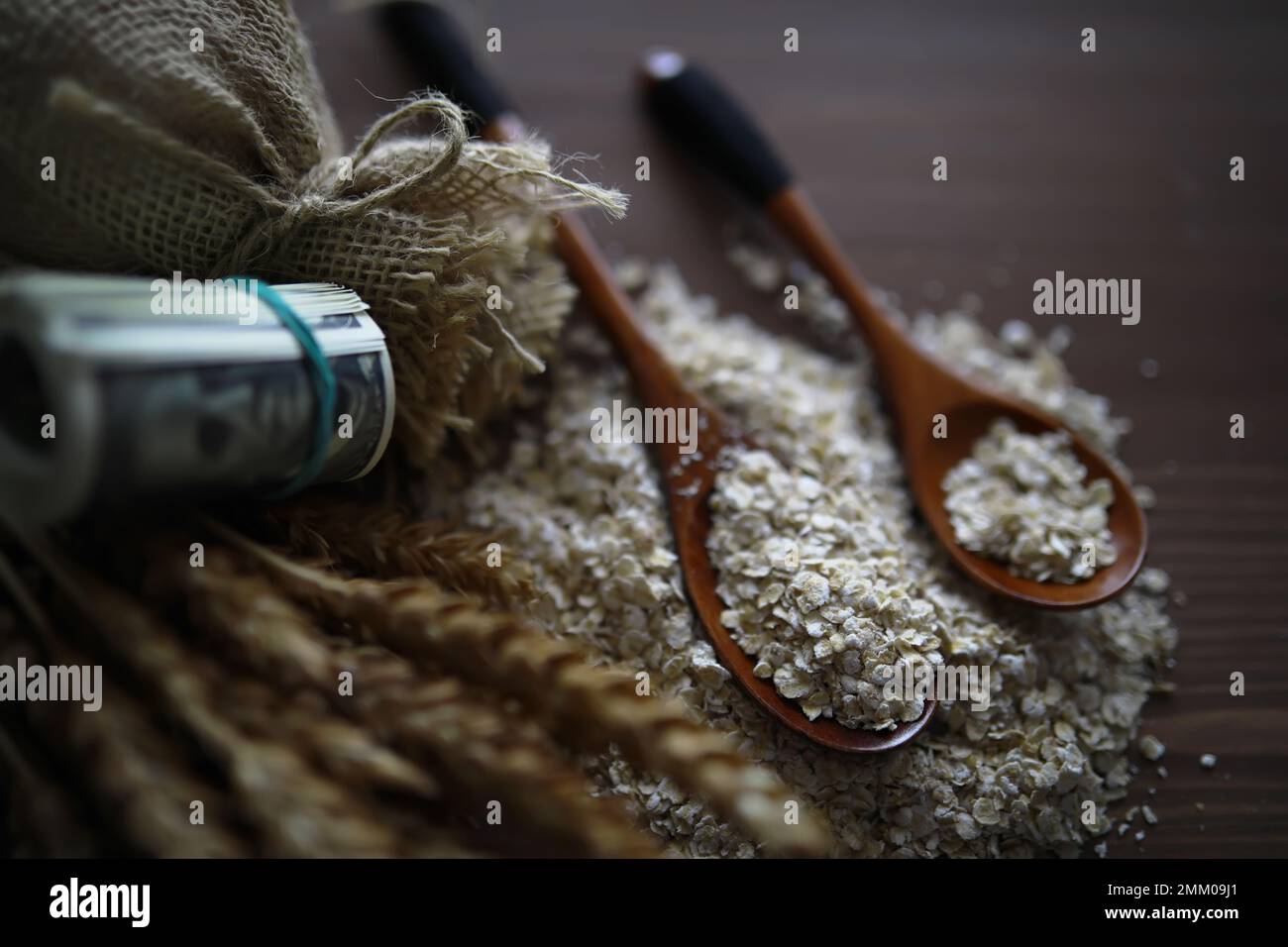 The concept of the cost of grain. 5000 ruble banknotes around a handful