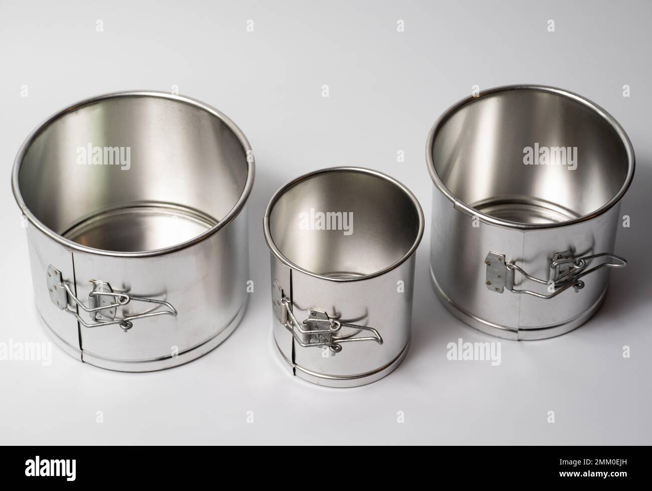 metal round forms for baking Easter for Easter in Ukraine, isolated on a white background Stock Photo