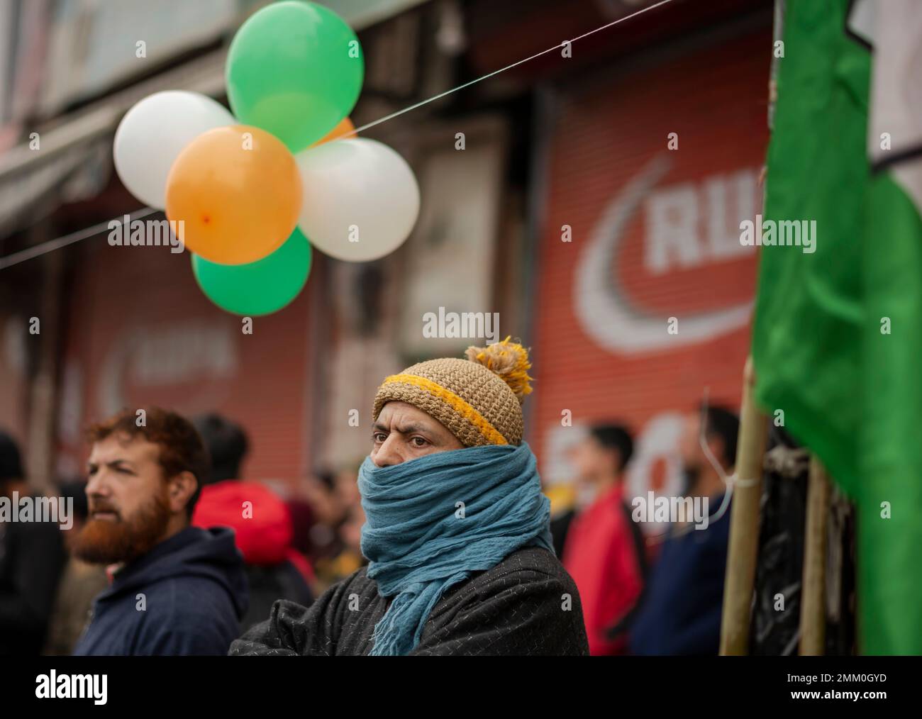 January 29, 2023, Srinagar, Jammu and Kashmir, India: A man watches as the Indian congress leader Rahul Gandhi leads Bharat Jodo Yatra in Srinagar. The Congress party is undertaking the 3,570-km ''˜Bharat Jodo Yatra' that began at Kanyakumari on September 7, 2022, and will end in Srinagar on January 30, 2022, covering 12 States in 150 days on foot. (Credit Image: © Idrees Abbas/SOPA Images via ZUMA Press Wire) EDITORIAL USAGE ONLY! Not for Commercial USAGE! Stock Photo