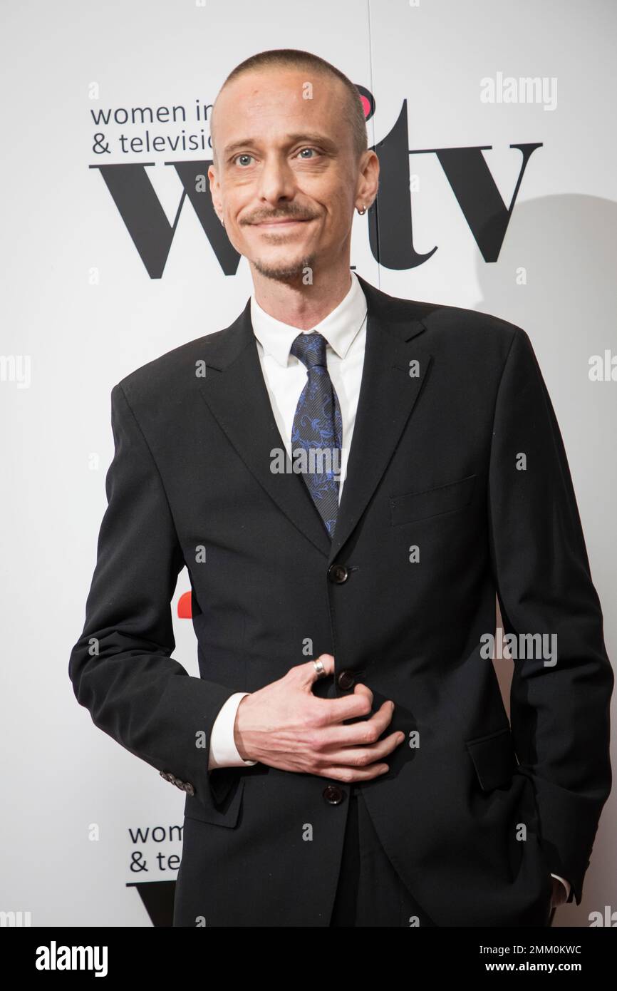 Actor Mackenzie Crook poses for photographers upon arrival at the Women