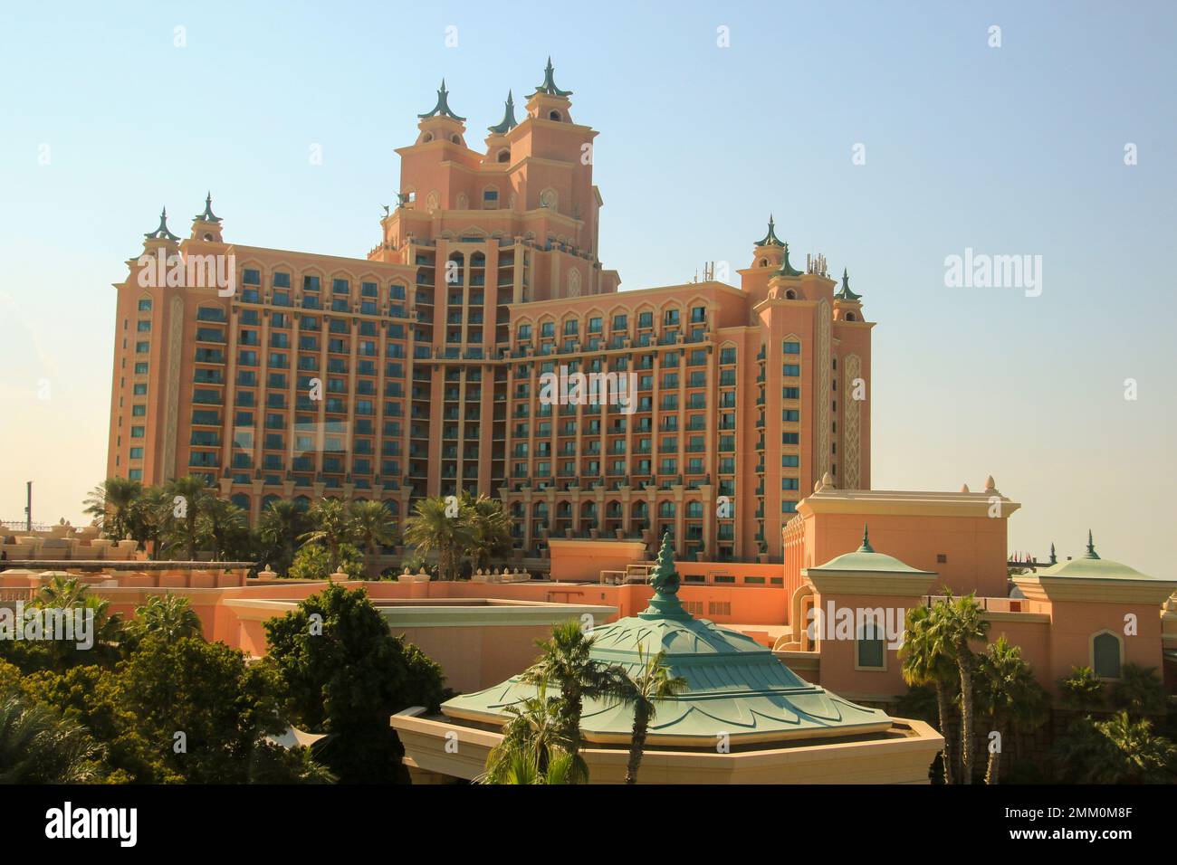 Monorail train approaching The Palm Atlantis luxury hotel on artificial