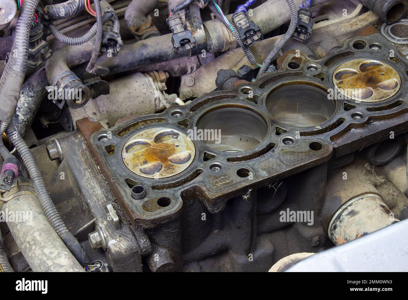 Car engine without cylinder head. Repair of the internal combustion