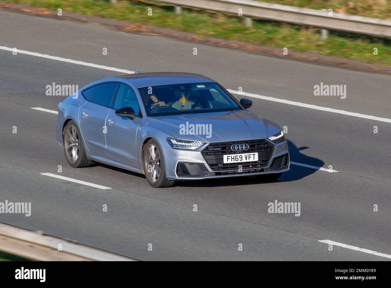 2020 (69) Silver AUDI A7 S LN  ED 40TDI MHEV Q SA 1968 cc  Electric Diesel 7 speed automatic; travelling on the M61 motorway UK Stock Photo