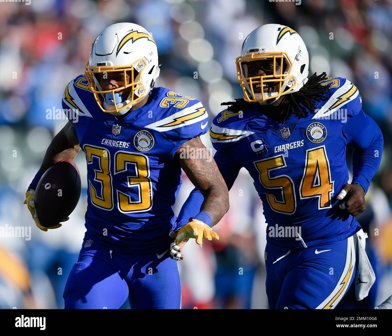 Los Angeles Chargers safety Derwin James, left, celebrates after an ...