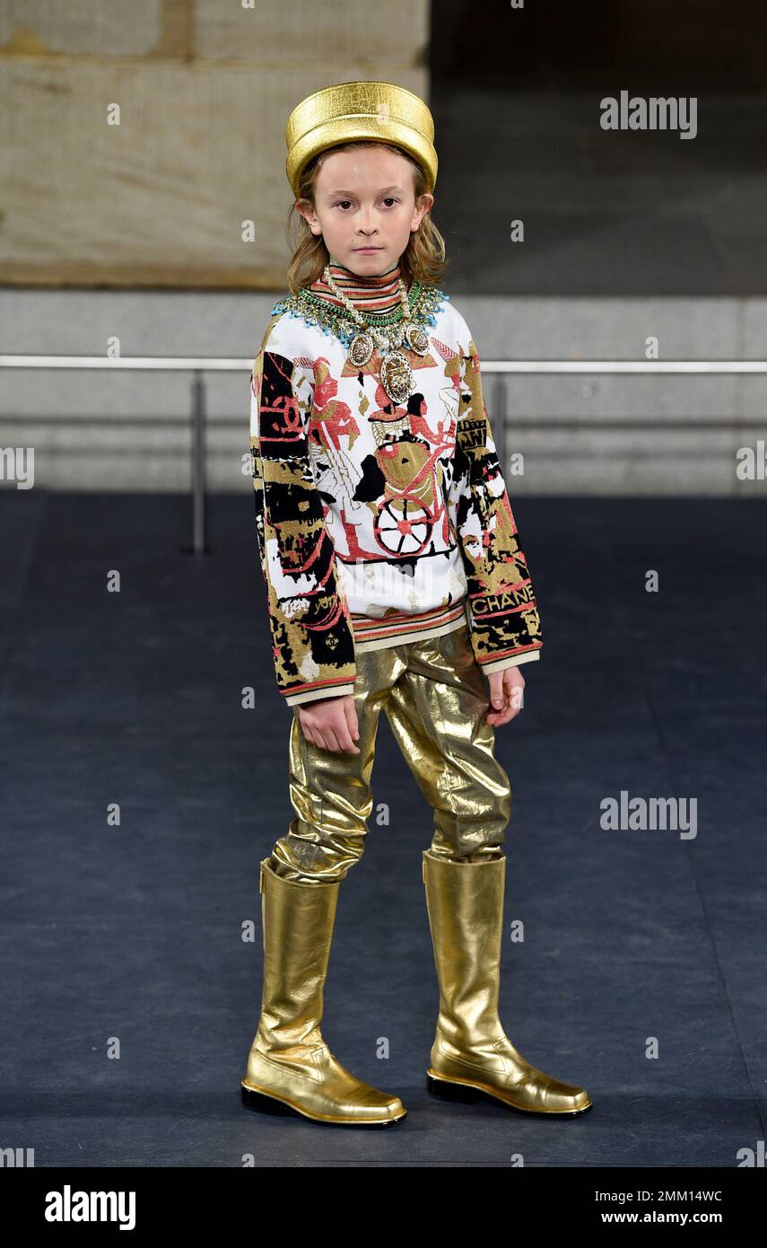 Karl Lagerfeld's godson Hudson Kroenig poses on the runway at the Chanel  Metiers d'Art 2018/19 Show at the Metropolitan Museum of Art on Tuesday,  Dec. 4, 2018, in New York. (Photo by