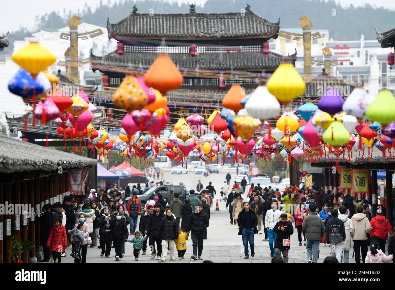 Beijing, China's Guizhou Province. 26th Jan, 2023. People tour Jiuzhou ancient town in Huangping County, southwest China's Guizhou Province, Jan. 26, 2023. Credit: Wang Chao/Xinhua/Alamy Live News Stock Photo