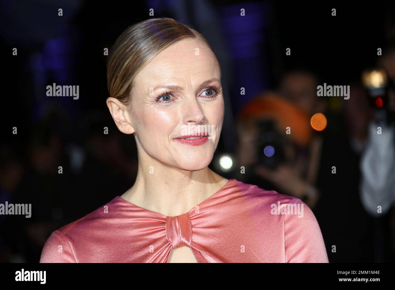 Actress Maxine Peake poses for photographers upon arrival at the
