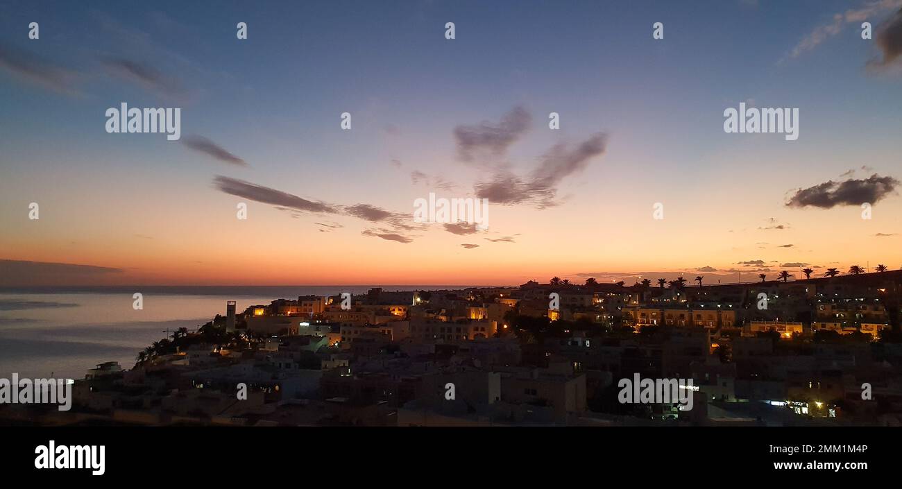 Night View with sunset of city Morro Jable Fuerteventura Stock Photo