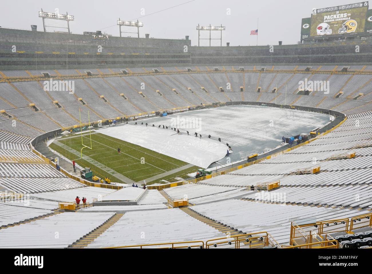 Lambeau Field is seen snow covered before an NFL football game between