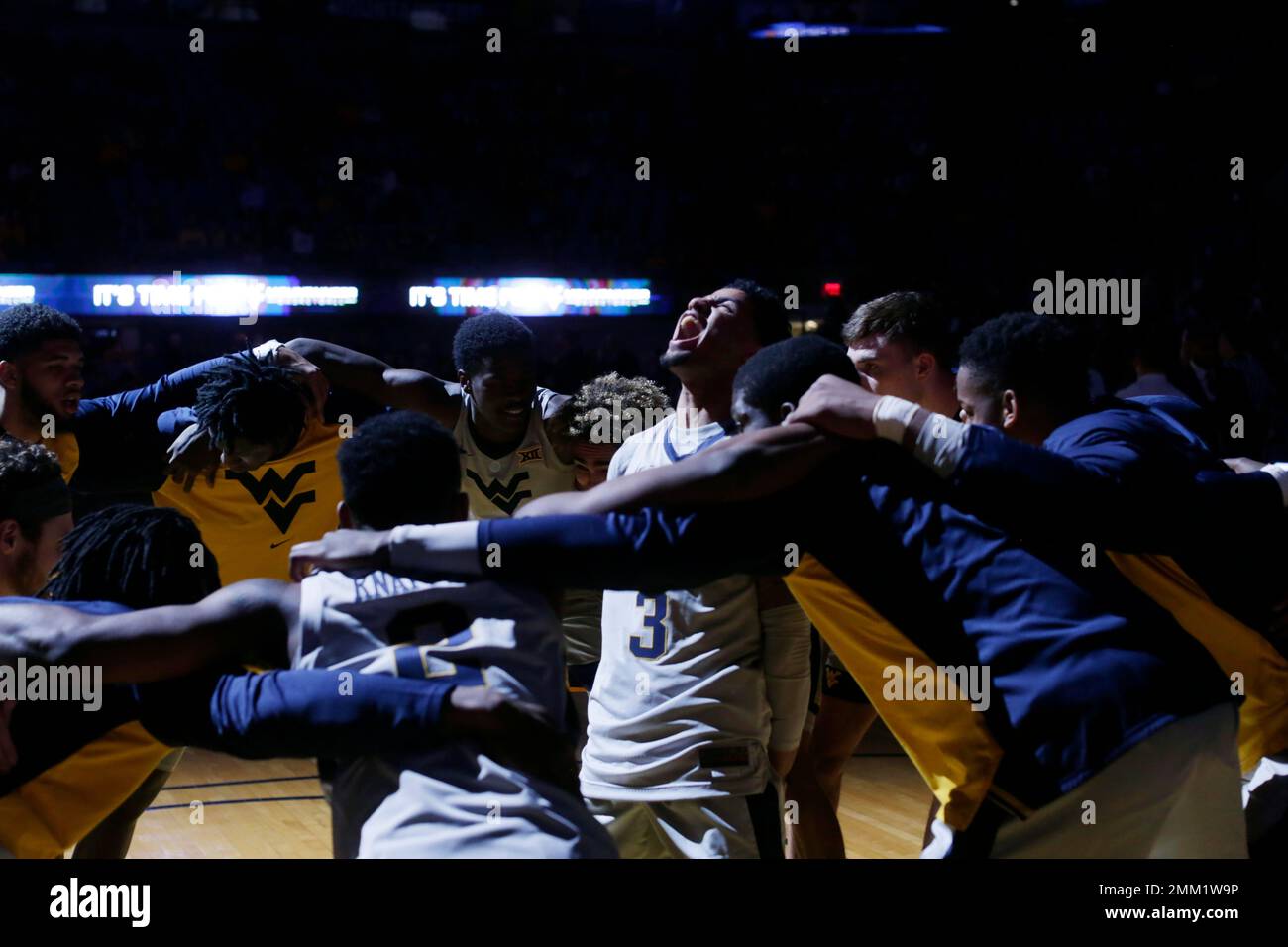 West Virginia guard James Bolden (3) yells during warmups before the start  of an NCAA college basketball game against Youngstown State, Saturday, Dec.  1, 2018, in Morgantown, W.Va. (AP Photo/Raymond Thompson Stock