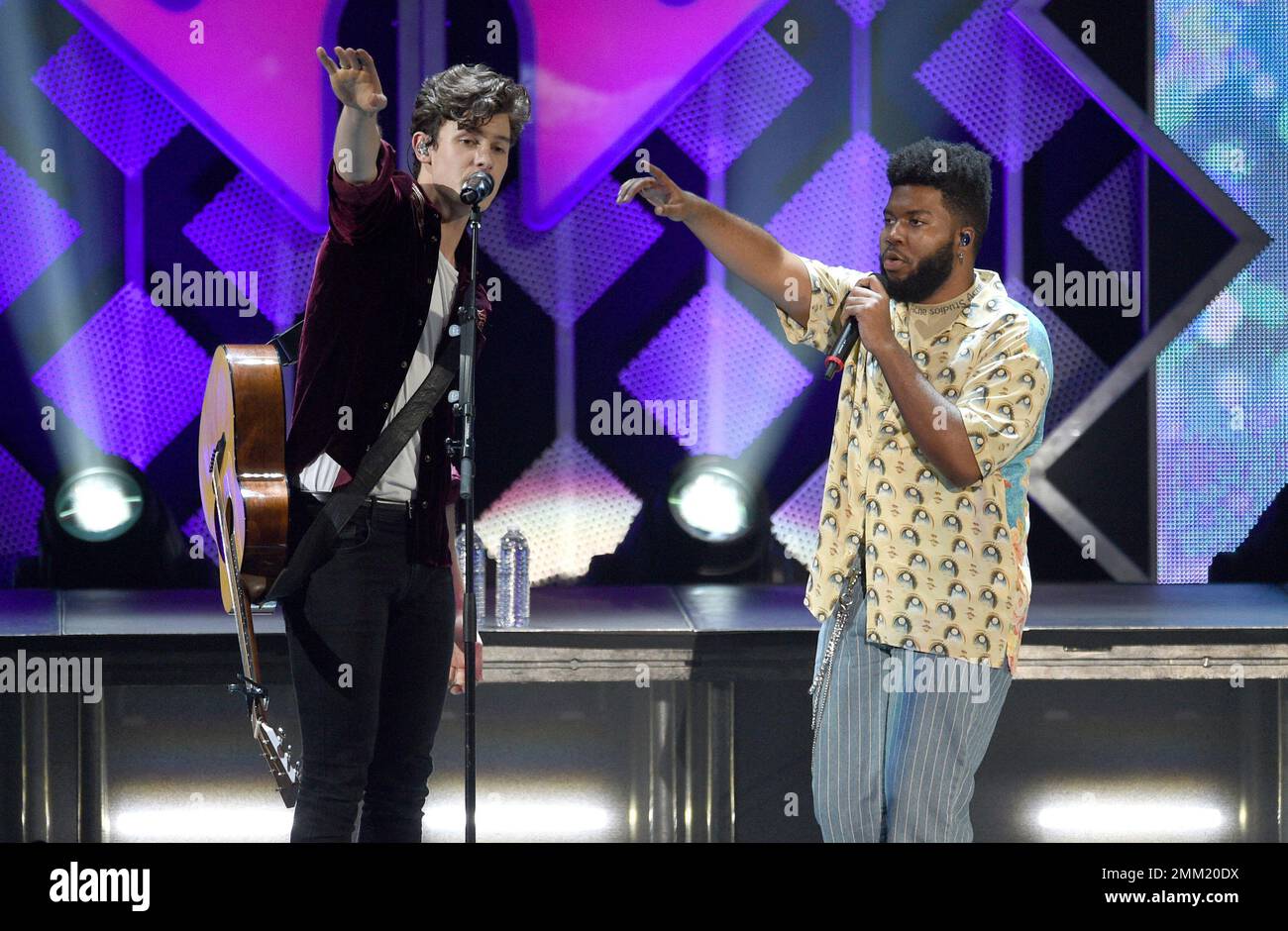 Shawn Mendes, left, and Khalid perform at Jingle Ball on Friday, Nov