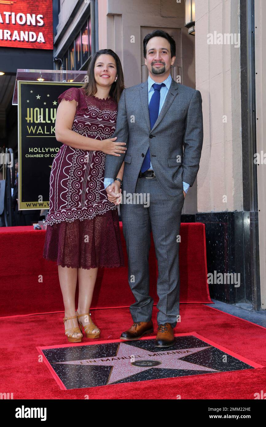 LinManuel Miranda, right, and wife Vanessa Nadal pose for a photo