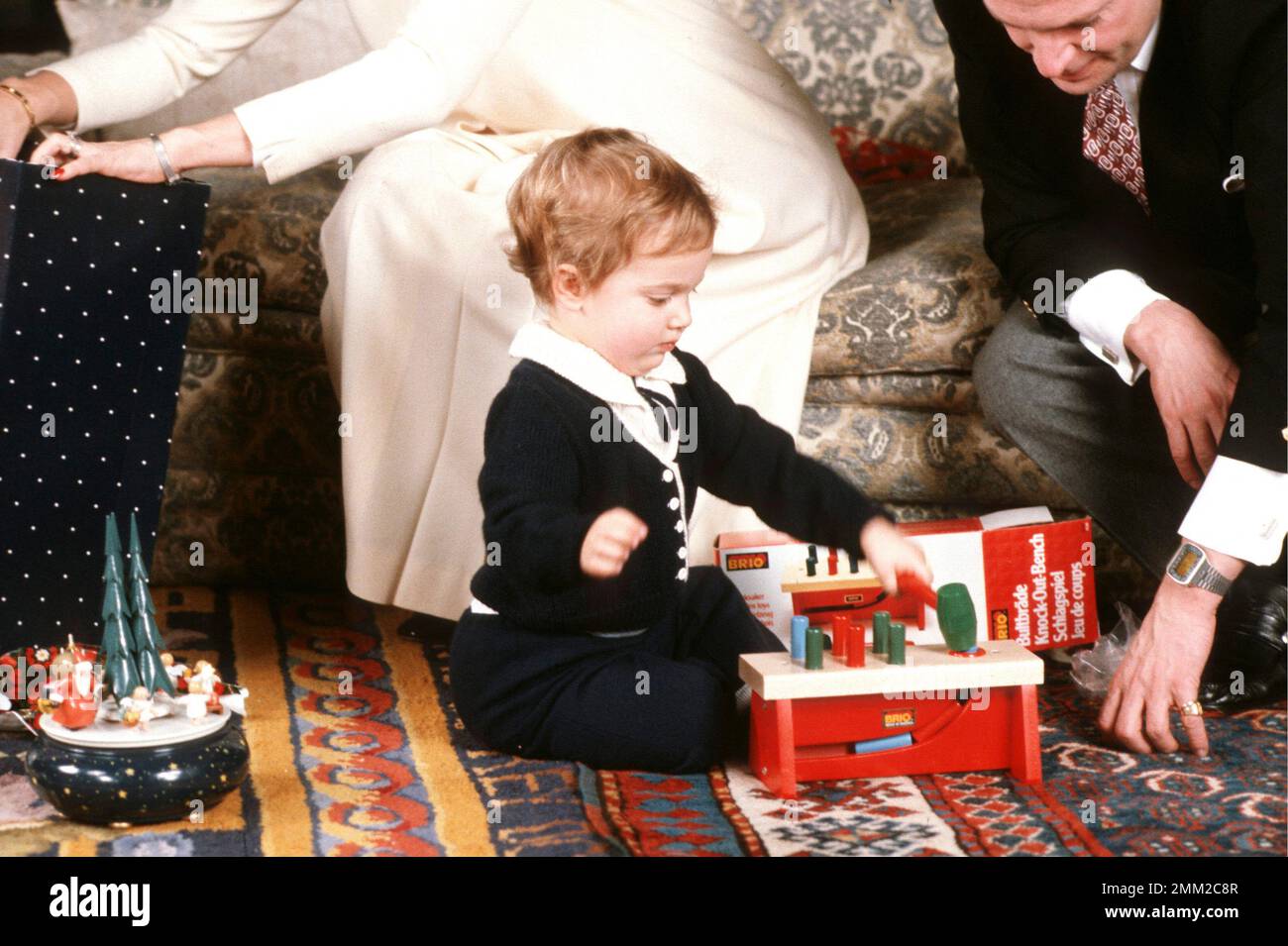 Carl XVI Gustaf, King of Sweden. Born 30 april 1946. Pictured with Queen Silvia and their son prince Carl Philip in a christmas photosession december 1981. Stock Photo