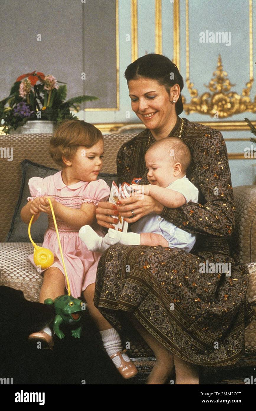 Carl XVI Gustaf, King of Sweden. Born 30 april 1946. Pictured with Queen Silvia and their daughters crown princess Victoria and princess Madeleine at christmas december 1979. Stock Photo