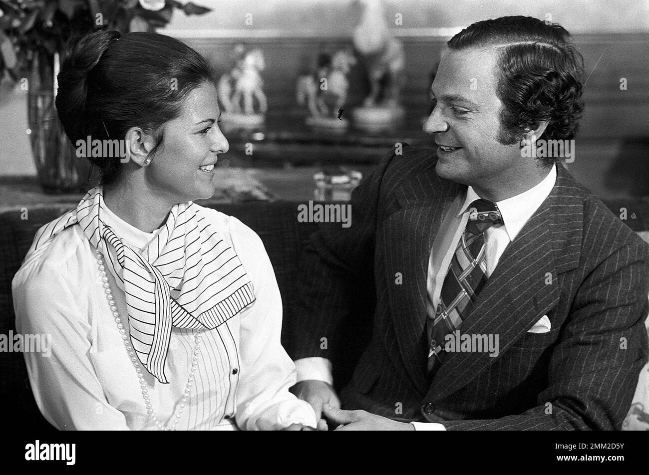 The engagement between King Carl Gustaf and Silvia Renate Sommerlath was announced on 12 March 1976 at the Royal Palace. The King and Silvia on the green engagement couch in Sibylla's floor at Stockholm's Royal Palace on March 13, 1976, where they meet the Swedish media. Stock Photo