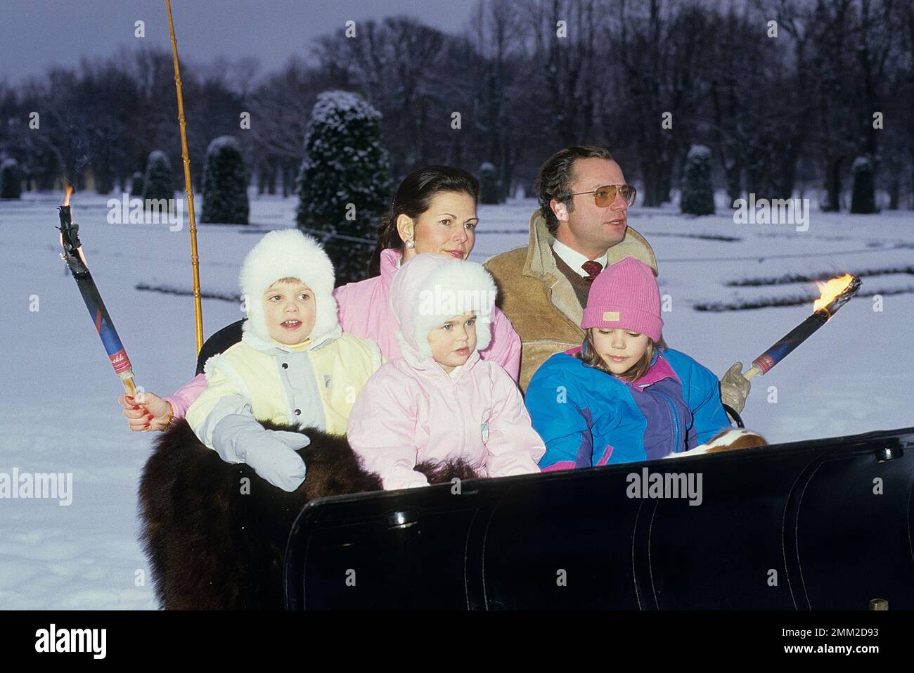 Carl XVI Gustaf, King of Sweden. Born 30 april 1946.  The King Carl XVI Gustaf,  Queen Silvia and their children, princess Madeleine, crown princess Victoria, prince Carl Philip, pictured in the park of Drottningholm castle 1985 at the annual christmas/winter photo session. Stock Photo