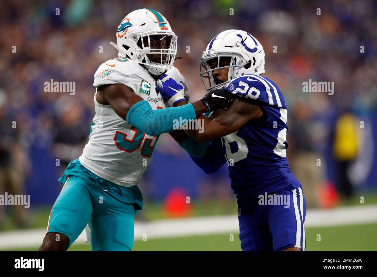 Miami Dolphins defensive back Walt Aikens (35) and Indianapolis Colts ...