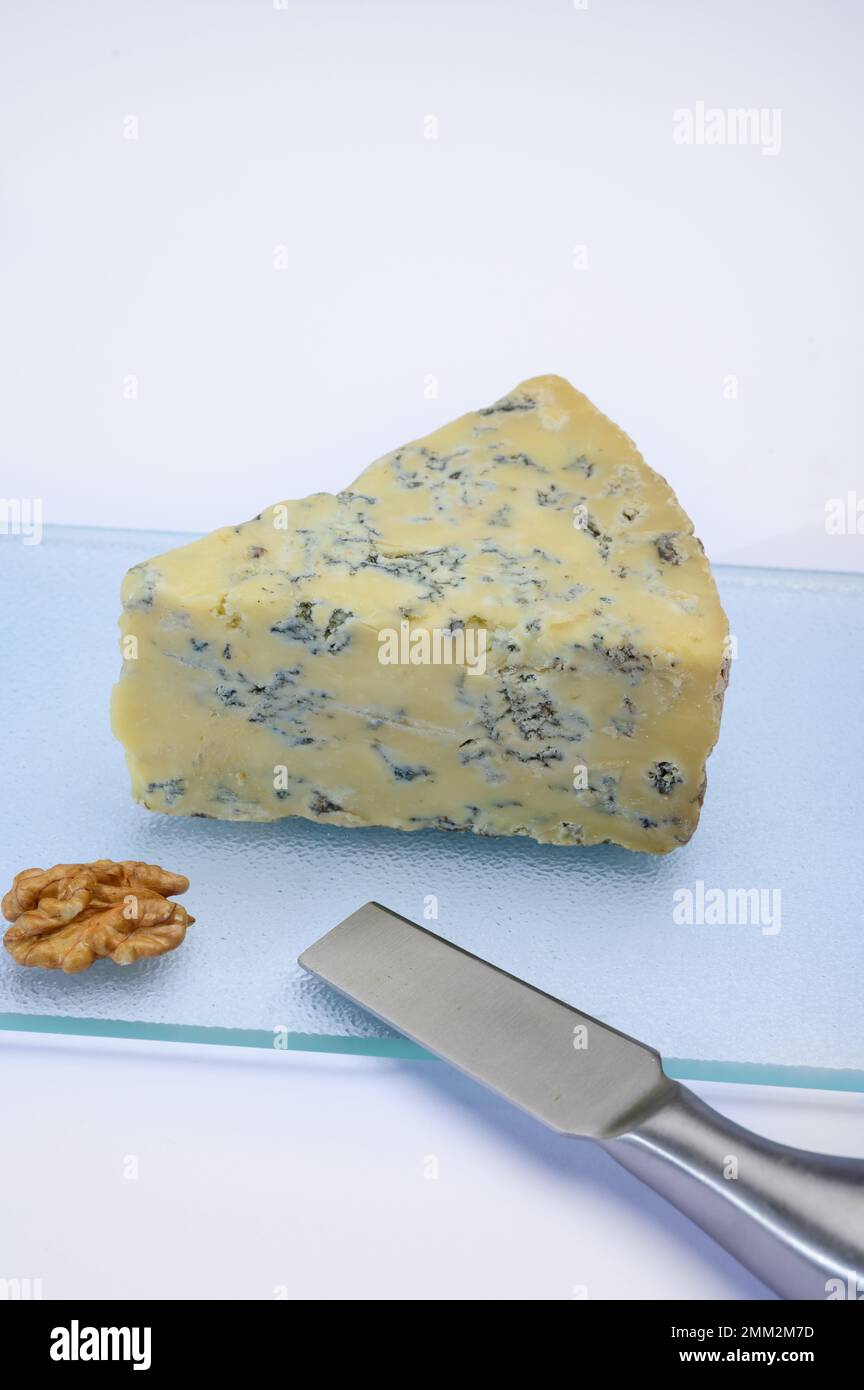 Cheese collection, piece of English old stilton blue cheese close up