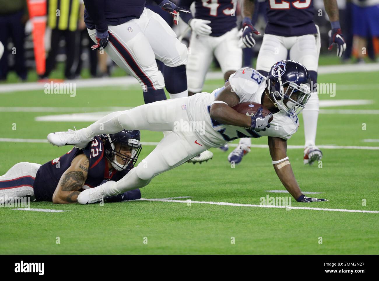 Houston Texans free safety Tyrann Mathieu (32) stops Tennessee Titans ...
