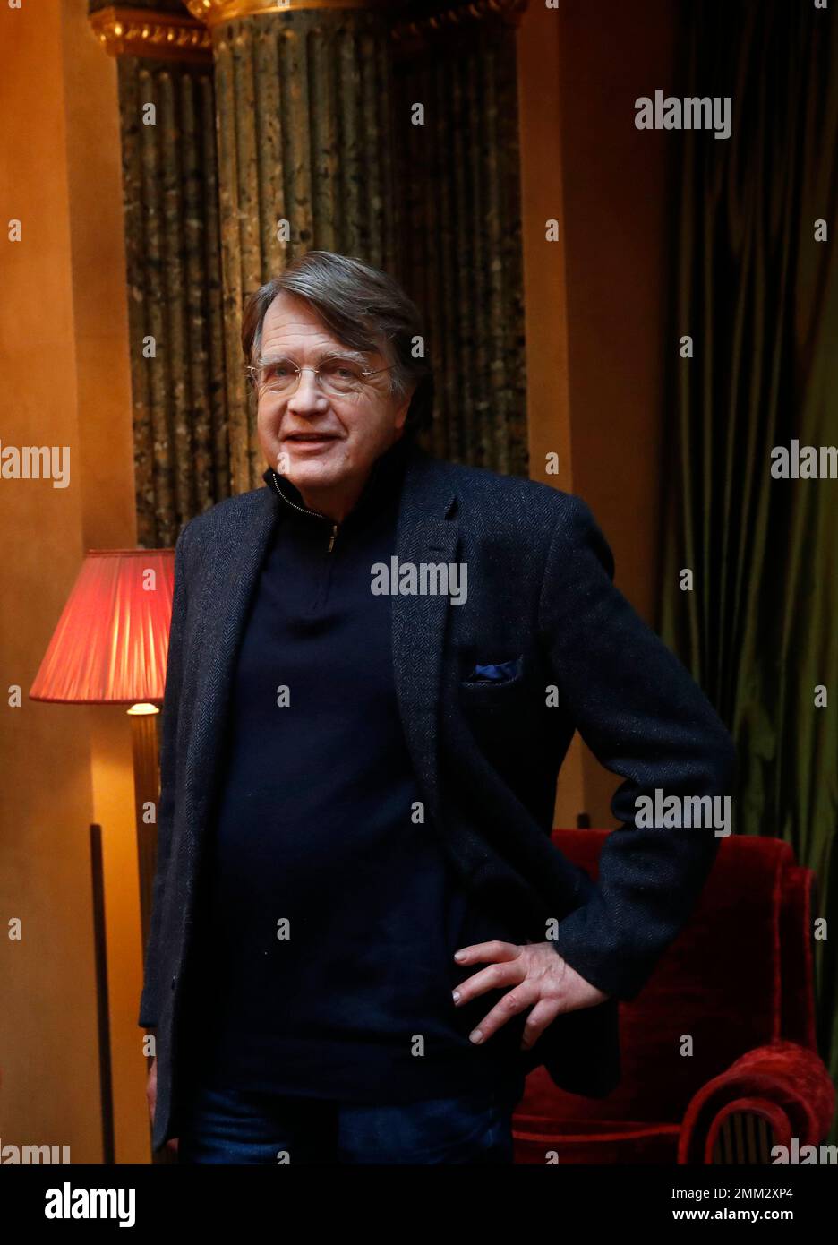 Merlin Holland, grandson of Oscar Wilde, poses during a photocall for the film "The Happy Prince" in Paris, Monday, Nov. 26, 2018. (AP Photo/Christophe Ena) Stock Photo