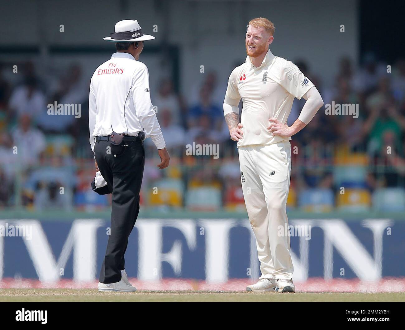 England's Ben Stokes looks at umpire Sundaram Ravi during the fourth ...