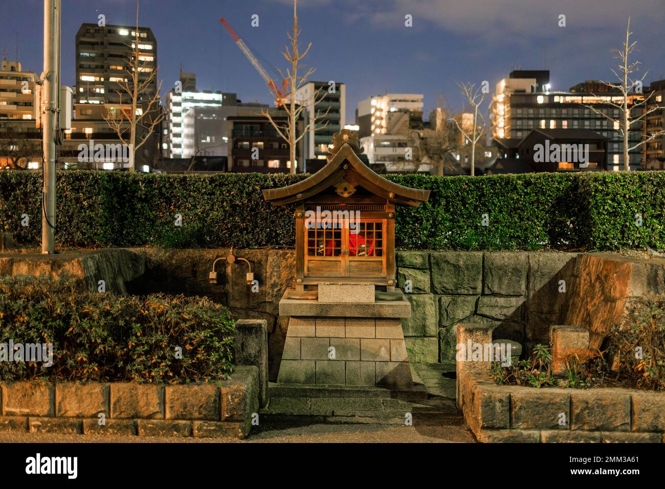 Small neighborhood shrine on quiet Kyoto street at night Stock Photo ...