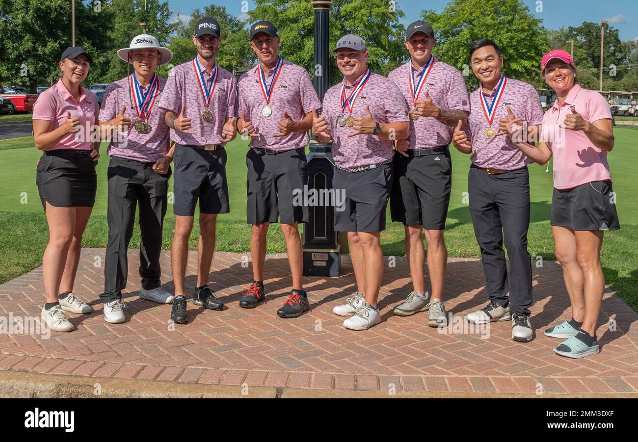members-of-the-all-army-golf-team-pose-for-a-photo-after-clenching-top
