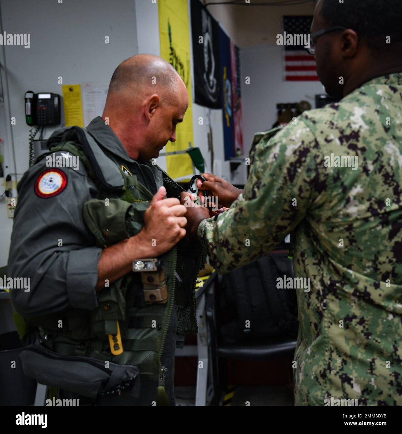 Reserve Deputy Commander Rear Adm. Brad Dunham, Commander, Naval Air Force Reserve, gears up for his final flight on the P-3C Orion with Patrol Squadron (VP) 69 at Ault Field in Oak Harbor, Washington September 14, 2022. VP-69, a Navy reserve squadron, is slated to complete their transition to P-8 Poseidon aircraft later this year, sundowning the P-3C Orion for Navy operational squadrons. Stock Photo