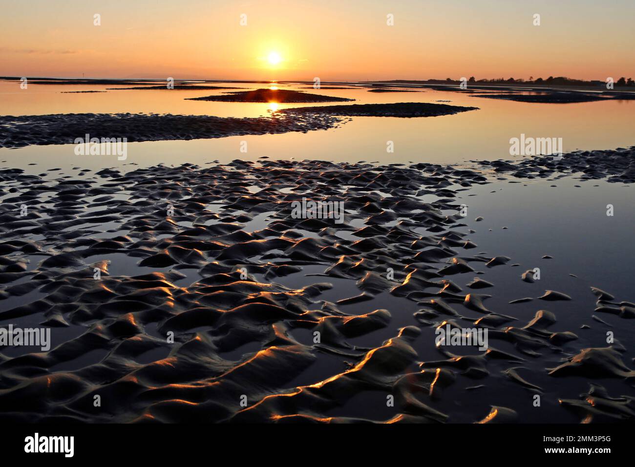 Sands flats exposed at low tide at West Wittering, West Sussex, UK Stock Photo Alamy
