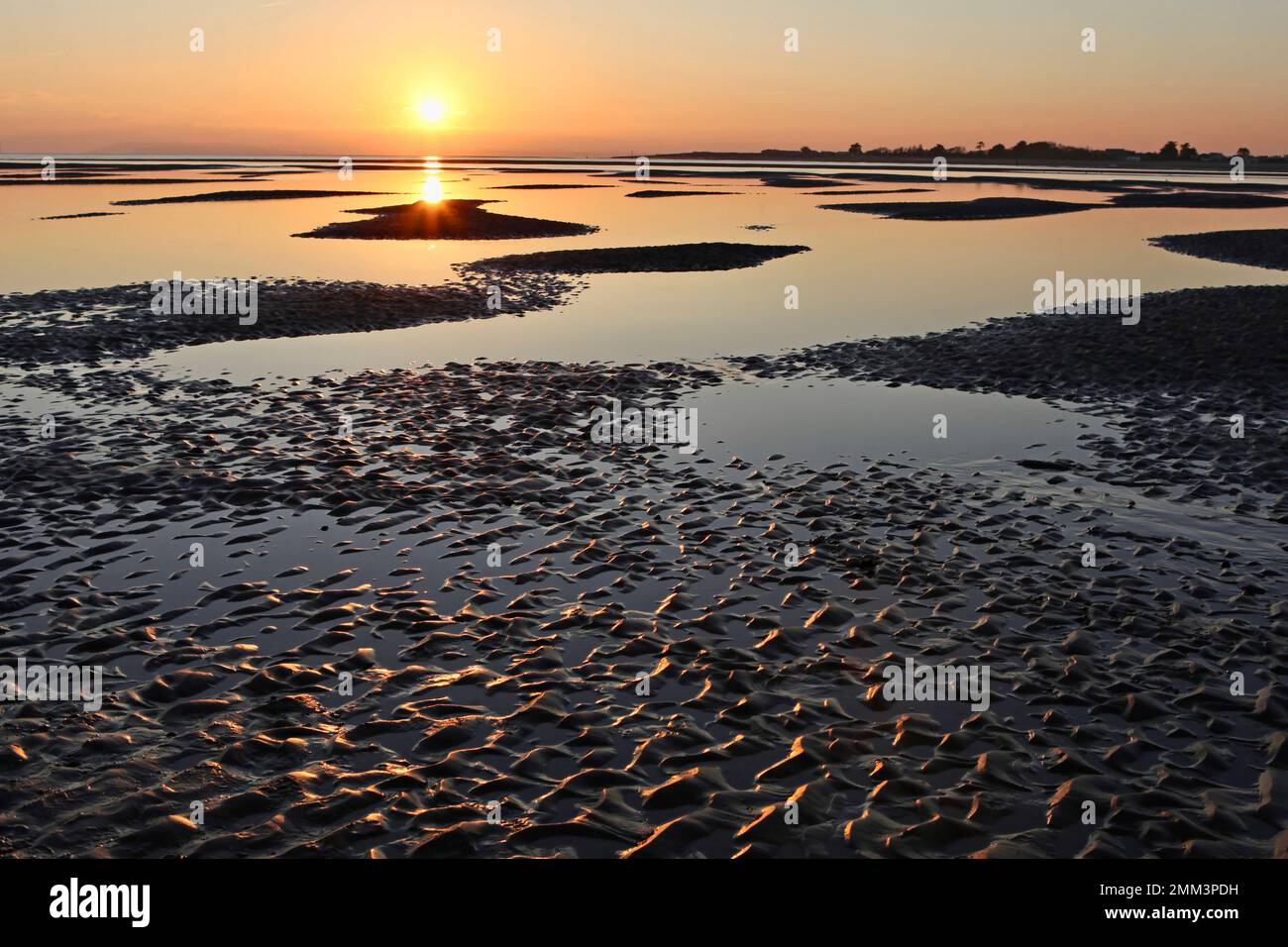 Sands flats exposed at low tide at West Wittering, West Sussex, UK. Stock Photo