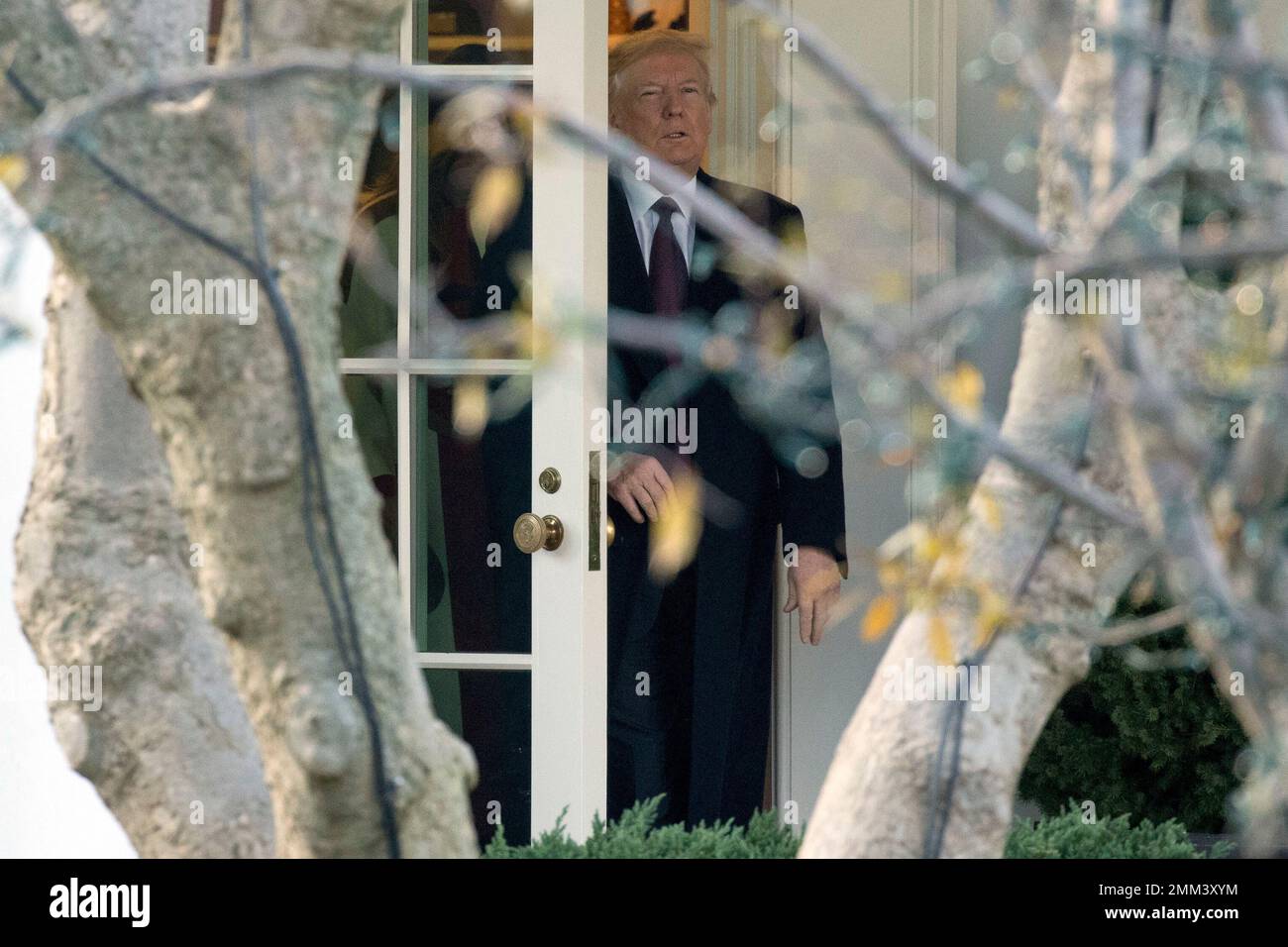 President Donald Trump walks out of the Oval Office to board Marine One ...