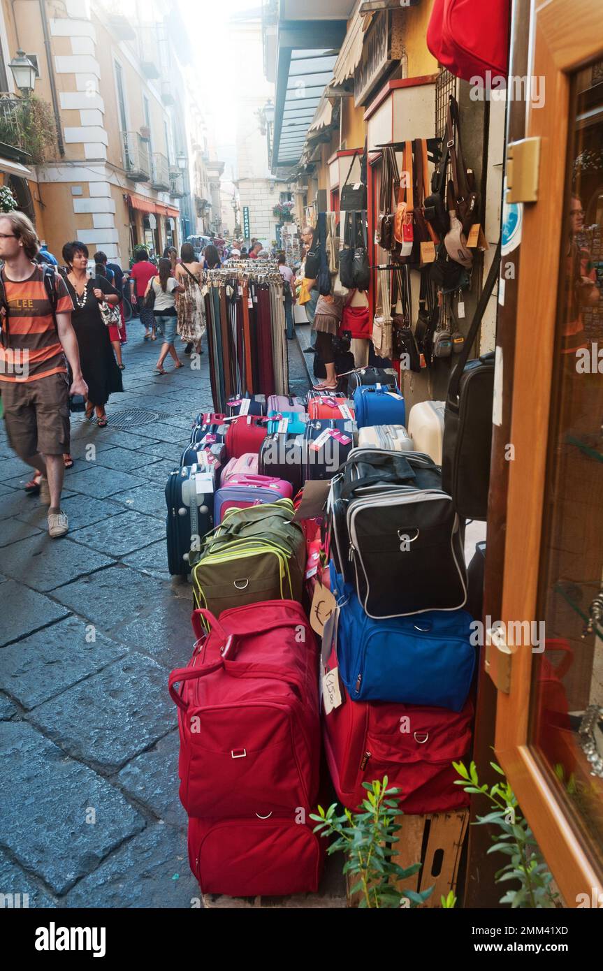 Suitcases outside a shop in a street scene in Sorrento, Italy Stock Photo