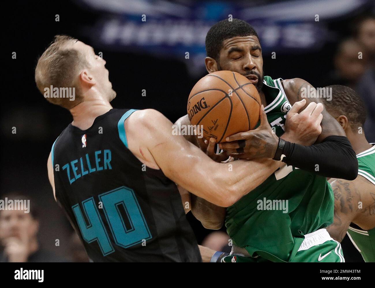 Charlotte Cody Zeller (40) and Boston Celtics' Kyrie Irving