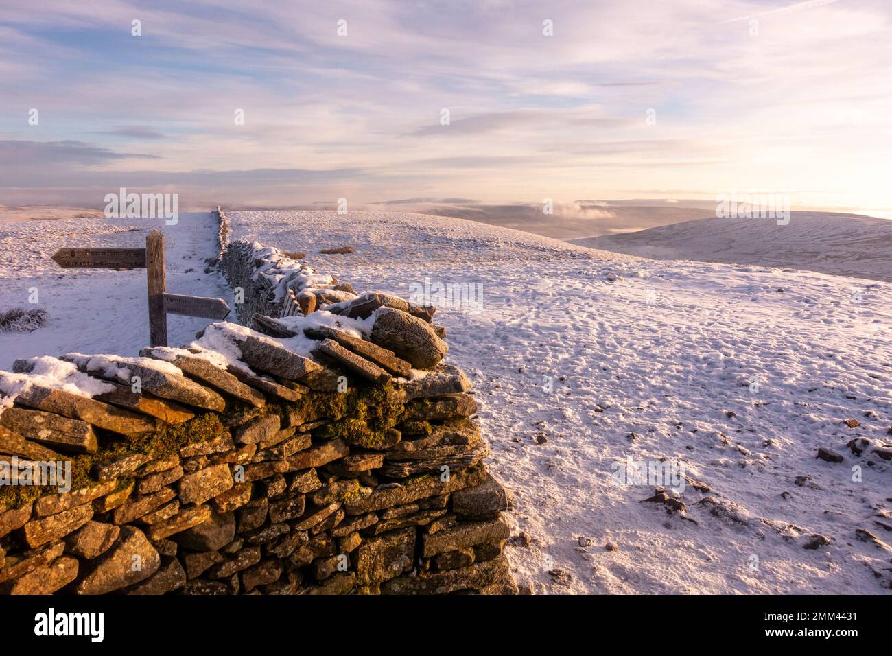 Snowy landscape from the summit plateau of Pen-y-ghent mountain in winter - one of the Yorkshire Three Peaks in the Yorkshire Dales National Park - wi Stock Photo