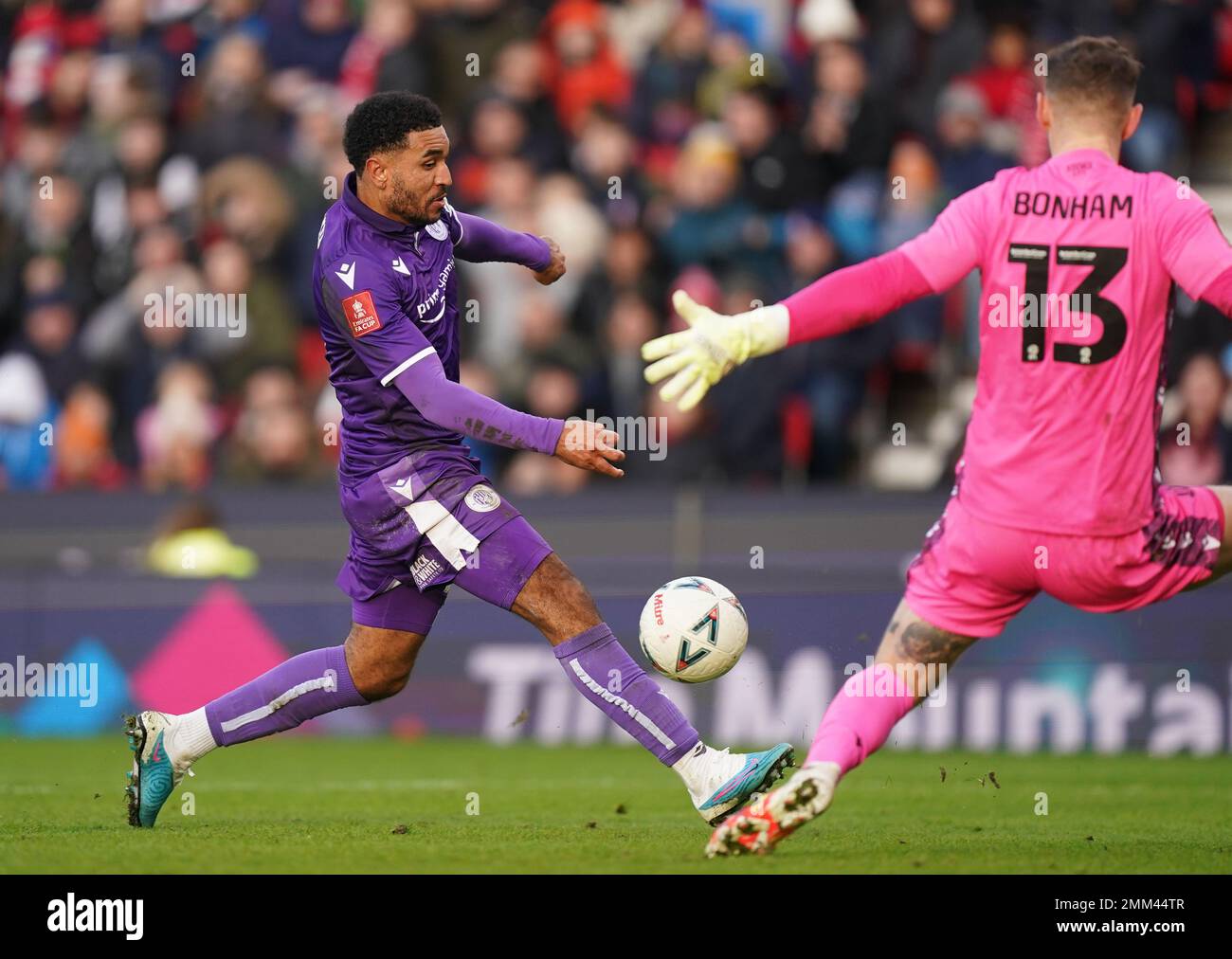 Stevenage's Jamie Reid scores their side's first goal of the game ...