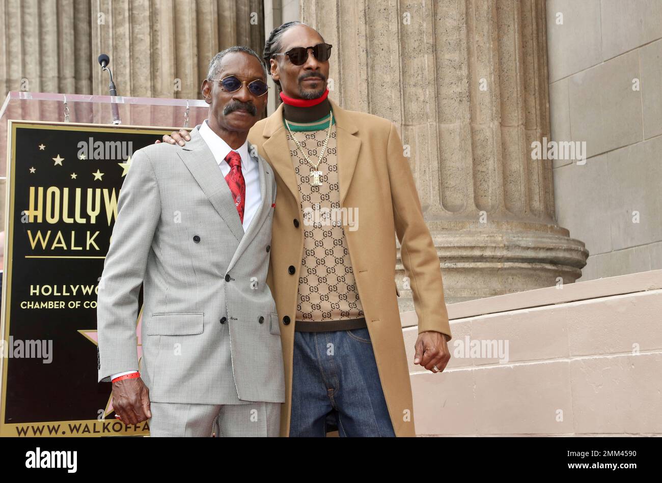 Honoree rapper Snoop Dogg, right, and his father Vernell Varnado attend
