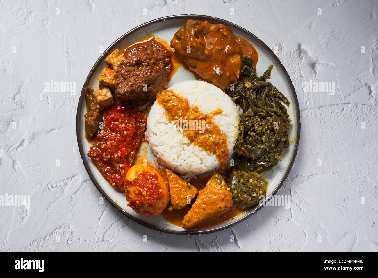 Famous traditional Indonesian food: Nasi Padang Stock Photo