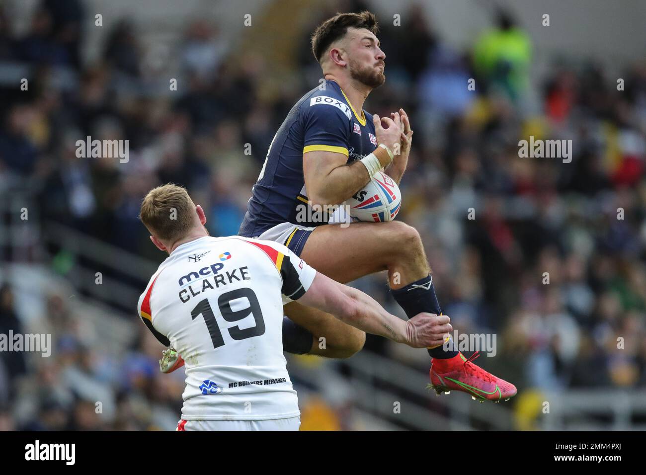 Liam Tindall #23 of Leeds Rhinos catches the ball during the Rugby League Pre Season match Leeds Rhinos vs Bradford Bulls at Headingley Stadium, Leeds, United Kingdom, 29th January 2023  (Photo by James Heaton/News Images) Stock Photo
