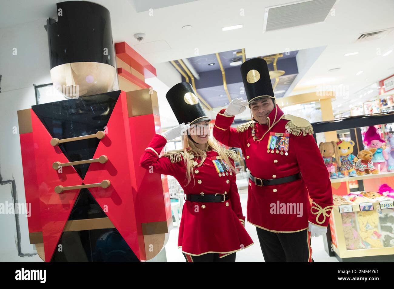 In this Tuesday, Nov. 13, 2018 photo, FAO Schwarz toy soldiers dressed