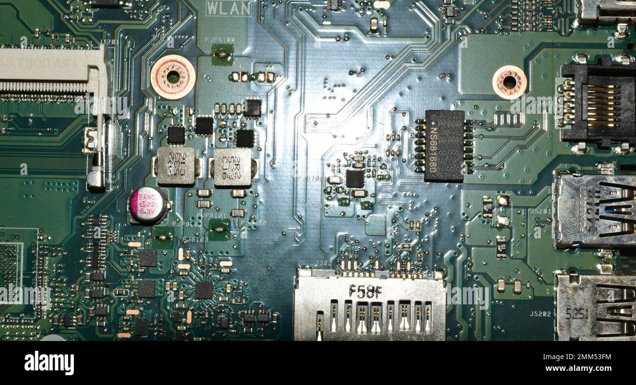 Green printed circuit board from an old Laptop that looks like a scifi