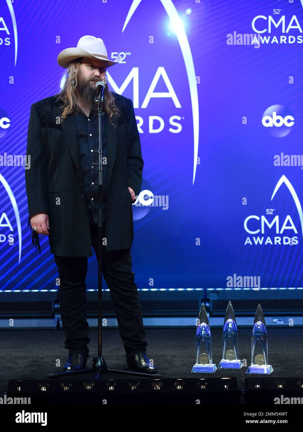 Singer/songwriter Chris Stapleton poses in the press room with the male